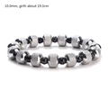 Detail showing 10mm black and knurled silver beads of a waterproof stretch bracelet - 10mm / Black and Silver Mix (YB900BLK)