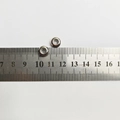 Dettaglio di perline in acciaio inossidabile da 8 mm per bracciale snake con righello - Perlina di Posizionamento