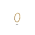 Detailed view of a 2mm stainless steel beaded elastic ring with a minimalist ball design - Gold Plain Band