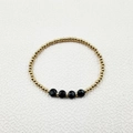 Detail of gold beaded bracelet featuring faceted black spinel stones on a white background - Single Beaded Bracelet (YB1015-BLK)
