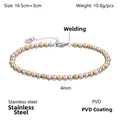 Detail eines dreifarbigen Edelstahl-Perlenarmbands mit Karabinerverschluss und Kette - Gold Silber Roségold Mix (YB-1035-RG)