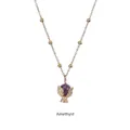 Detail of amethyst pendant with golden leaf-shaped holder on a beaded chain necklace - Amethyst Leaf Pendant (YN-1011G-PUR) / Gold