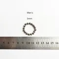Detailed view of 5mm silver stainless steel beaded elastic ring for men with scale - 5mm Men's Style (JZ1168S) / Silver
