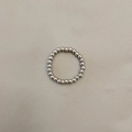 Macro shot of polished silver stainless steel beaded ring on light gray texture - Silver Tone 3mm Men's Style