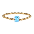 Detail of golden beaded bracelet with a light blue ceramic elephant pendant on white back - Gold Aqua Elephant