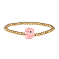 Macro view of gold-plated beads and a pink ceramic elephant charm on the bracelet - Gold Pink Elephant