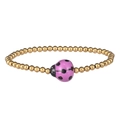 Detailed close-up of golden beaded bracelet with a cute purple ladybug charm - Gold Purple Ladybug