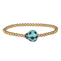 Detailed shot of golden stainless steel beaded bracelet with turquoise ladybug charm - Gold Turquoise Ladybug