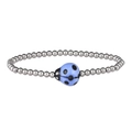 Macro detail of stainless steel beaded bracelet featuring a light blue ceramic ladybug charm - Silver Light Blue Ladybug