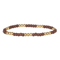 Vue détaillée du bracelet en perles style indien avec bois brun et acier doré - Marron Foncé (Perles Dorées)