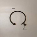 Detail of 3mm black stainless steel flexible open bracelet with 8mm screw-on bead - Bangle Without Spacing Bead (YB1167BLK-3mm) / Black