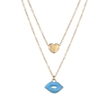 Detail of layered gold necklace featuring a blue enamel lip and heart pendant charms - Gold Light Blue