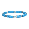 Detalle de cuentas cilíndricas azul mate y espaciadores metálicos plateados en la pulsera - Azul lago