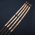 Set of four rose gold flat snake chain bracelets with colorful round gemstones - Black Rhinestone / Rose Gold Bracelet