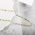 Minimalist 18K gold plated stainless steel lip link necklace on white ceramic tray - Gold