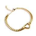 Bracelet chaîne serpent en acier inoxydable doré avec pendentif cœur évidé et fermoir - Bracelet / Or
