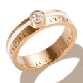 Rose gold titanium ring with Roman numerals, white enamel inlay, and a large zircon center - US 7 / Rose Gold