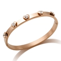 Polished rose gold hinged bracelet featuring five heart charms with inlaid clear crystals - Bangle / White Zirconia Rose Gold Bangle