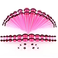 Rosa Acryl-Ohrdehnungsset mit Dehnungsstäben und Plugs inklusive schwarzen O-Ringen im Detail - Transparentes Rosa
