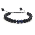 Close-up of matte black beads and blue tiger eye stones on adjustable woven rope - Blue And Matte