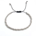 Bracelet à billes en acier inoxydable 4mm avec cordon tressé noir réglable sur fond blanc uni - Argent 4mm