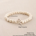 Detail of 8mm beige turquoise beaded bracelet with natural texture and cross charm - Beige Turquoise Natural Stone (NZ01-8)