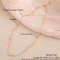 Detail of 3-layer gold-plated copper necklace with flat beads on textured fabric - Beaded Link Chain Necklace (NW01-9)