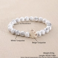 Detail of 8mm white turquoise beaded bracelet with a beige elephant stone charm - Natural White Turquoise Beige Turquoise (NZ01-6)