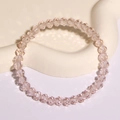 Minimalistisches Armband aus champagnerrosa Kristallperlen mit facettierten Glassteinen - Hellrosa