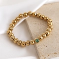 Gold plated stainless steel beaded bracelet with emerald green stone accent - 5mm / March