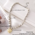 Beaded necklace with irregular silver beads and large gold heart pendant - Silver Beads Gold Heart Irregular (NY04-9)