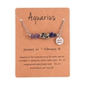 Aquarius necklace with irregular natural stones and wave symbol pendant on card - Aquarius