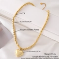 Gold plated beaded necklace featuring a large mirror heart pendant and adjustable steel chain - Gold Fine Beads Heart Pendant (NY05-6)