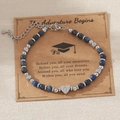 Bracelet en perles de lapis-lazuli avec breloque cœur argentée et lettre G sur carte - Lettre G