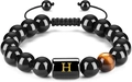 Pulsera ajustable de cuentas negras con ojo de tigre y dije con la letra H dorada - Letra H