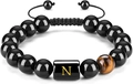 Pulsera ajustable de ojo de tigre con cuentas negras y dije de letra N dorada - Letra N