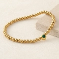 Golden beaded bracelet featuring a green heart-shaped zircon stone inlay for women - Green