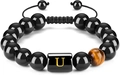 Pulsera de ojo de tigre con letra U dorada sobre un dije negro pulido - Letra U