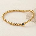 Golden beaded bracelet with a heart-shaped pendant featuring a dark blue zircon stone - Dark Blue