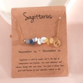 Golden Sagittarius necklace featuring mixed crystal stones and zodiac symbol charm - Sagittarius (XS-15-SS)