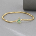 Gold-plated beaded bracelet featuring a sparkling green crystal Christmas tree charm - Green Zirconia Christmas Tree Charm Style (NAG09-1)