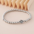 Minimalistisches Perlenarmband aus Edelstahl in Silber mit Kreuzanhänger auf hellem Grund - Geometrischer Kreuzanhänger (NAD03-8) / 5mm Nicht Verblassender Edelstahl