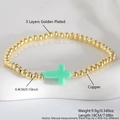 Beaded bracelet with 4mm golden copper beads and mint green cross charm detail - Green Cross (NAH10-2)