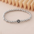 Elastisches Perlenarmband aus Edelstahl mit schwarzem Lotusblumen-Anhänger - Lotus-Muster Anhänger (NAD04-3) / 5mm Nicht Verblassender Edelstahl