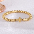 Elegant gold beaded stainless steel bracelet featuring a textured cross pendant - Polished Lined Cross Style (NAI04-2)