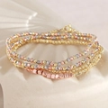 Gestapelte Perlenarmbänder mit facettierten Gold-, Silber- und Roségoldperlen und Anhängern - 3mm Eleven-Cut Perlenarmband Stapel