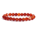 Close-up of 6mm red agate beaded stretch bracelet with natural stone texture and gloss - Red Stripe Agate / 6mm