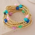 Set de pulseras de cuentas doradas con dijes de cruces de colores en piedra natural - Juego de 7 Pulseras