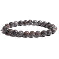 Vue détaillée d'un bracelet en perles de pierre naturelle 10mm au fini minéral poli - 8mm / Pierre de flamme