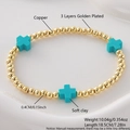 Beaded bracelet with golden copper beads and turquoise soft clay cross charms - Sky Blue Cross